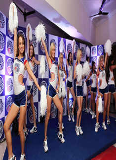 Cheerleaders perform at Chinnaswamy stadium
