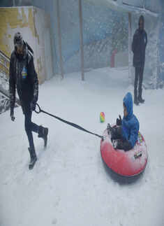 Mumbaikars attend the launch of Snow World