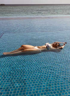 Minissha Lamba is enjoying the blue waters on the beaches of Maldives