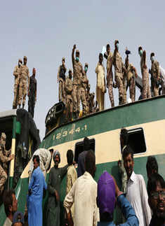 At least 65 killed as passenger trains collide in Pakistan
