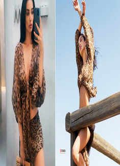 After breakup rumours with fianc&eacute; George Panayiotou, Amy Jackson turns heads in stylish leopard print beachwear