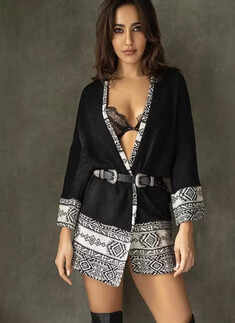 Actress Neha Sharma's bewitching pictures in black cutout bikini will blow your mind