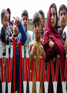 35 pictures of Afghan refugees housed in temporary shelters