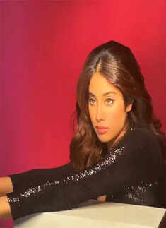 Janhvi Kapoor casts a spell in these glamorous pictures in her deep-cut bodycon dress