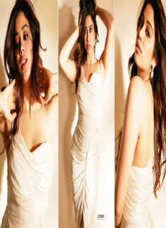 Janhvi Kapoor casts a spell in these glamorous pictures in her deep-cut bodycon dress