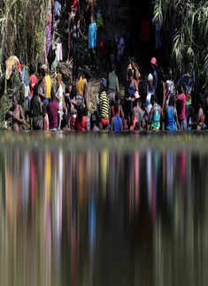 30 pictures of migrants who crossed Rio Grande river to enter US illegally