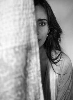 Neha Sharma oozes oomph in a blue bralette and an unbuttoned shirt in these new drool-worthy pictures