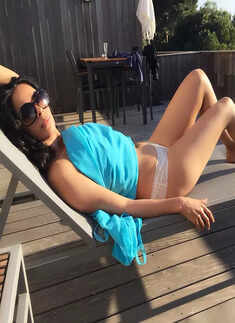 Mallika Sherawat flaunts her toned body in a yellow bikini in these new pictures; fans can&rsquo;t stop drooling