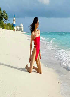 Manushi Chhillar is giving us major &lsquo;Baywatch&rsquo; vibes with her vacation pictures in a red swimsuit!