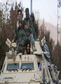 Taliban hold military parade with US-made weapons