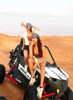 These jaw-dropping pictures from Janhvi Kapoor&rsquo;s new photoshoot in a shimmery black pant-suit with plunging neckline