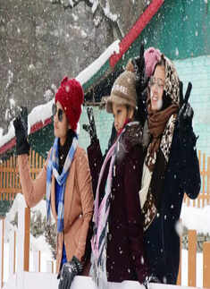 Tourists enjoy fresh snowfall in Kashmir; see pics