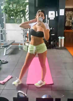 These pictures of Nora Fatehi enjoying her pool day in a black swimsuit will leave you stunned