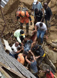 Mudslides leave at least 94 dead in Brazil; see pics