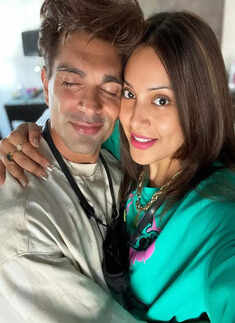 New pictures of Bipasha Basu in an oversized blue shirt dress from her dinner date with Karan Singh Grover spark pregnancy rumours