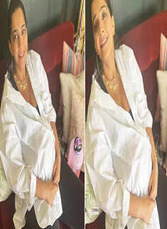 Soon-to-be mommy Sonam Kapoor flaunts her baby bump in an oversized white shirt in these new pictures