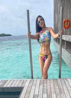 Sara Ali Khan commands attention in an edgy black thigh-high slit gown, see pictures