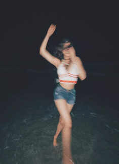 Janhvi Kapoor oozes oomph in a cherry red thigh-high slit backless dress in these gorgeous clicks