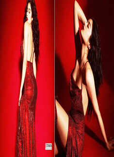 Janhvi Kapoor oozes oomph in a cherry red thigh-high slit backless dress in these gorgeous clicks