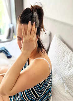 Lovely pictures of Neha Dhupia chilling with her little son in a pool will surely make your day