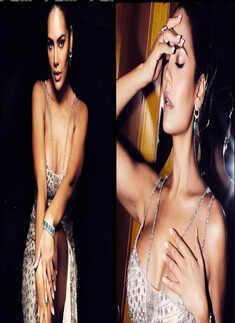 These pictures of Esha Gupta in plunging neckline thigh-high slit dress make fans go weak in the knees