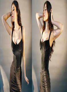 These pictures of Mouni Roy in black corset dress will leave you mesmerised!