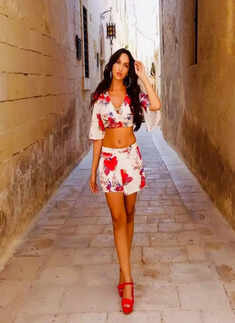 Nora Fatehi turns up the heat with her beach vacation pictures in a strapless black bralette