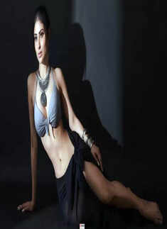 Mouni Roy sends internet into a tizzy in grey bralette and black sarong, see pictures