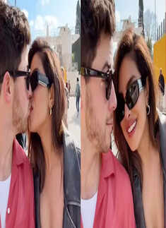 Priyanka Chopra and Nick Jonas share a kiss in front of the Colosseum in Rome