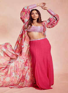 Malaika Arora oozes oomph in pink bralette, skirt and cape jacket