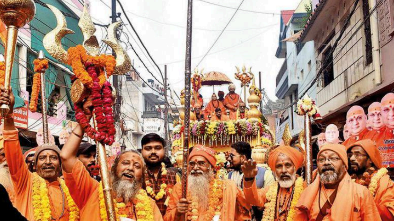 Maha Kumbh 2025: Saffron wave in Prayagraj as Anand Akhara enters Mela | Prayagraj News - Times of India