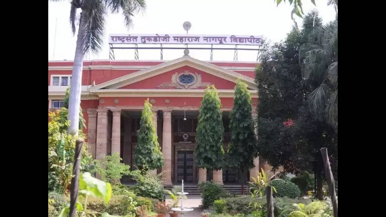 Nagpur University acting registrar gets clean chit in poll campaigning case  | Nagpur News - Times of India