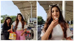 Rasha brings sweets for paparazzi at the airport