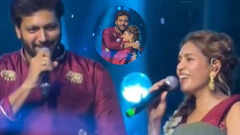 Ravi Mohan hugs Kenishaa after romantic song performance on stage