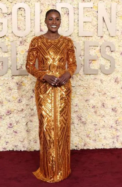 red carpet gold dress Metallic-shimmer trend dominated the red carpet at the Golden Globes 2024