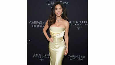 lauren sanchez gold dress Lauren Snchez's first bridal look? @Schiaparelli spring 2025 couture. The  gold look, designed by @DanielRoseberry, features a corseted bodice covered  in gold bugle beads as well as an off-the-shoulder neckline with  hand-embroidered