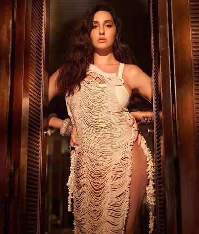 400px x 469px - Bold ambition! Nora Fatehi's slits go up to her waist in a Vaishali S dress  - Times of India